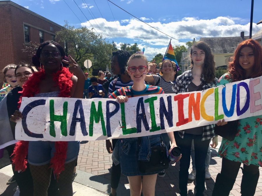 Students marching with Champlains Include+