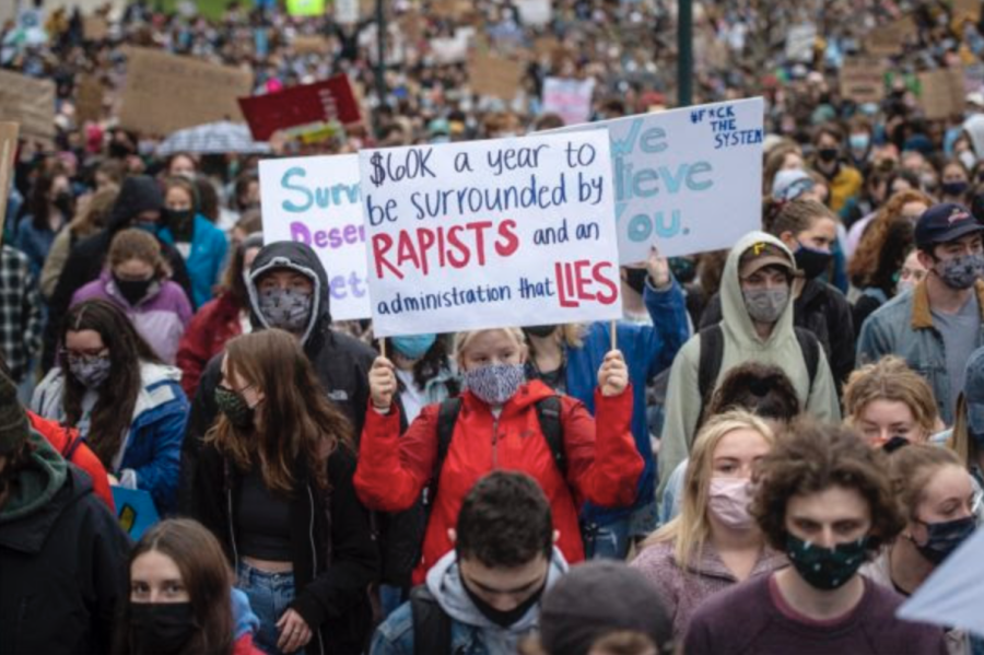 Students protest UVM’s failure to protect survivors. Photo: Glenn Russell for VTDigger.