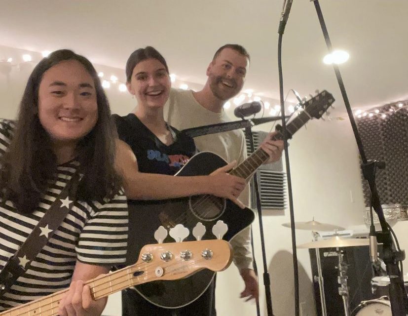 Jack Googins ('24), Abbey Berger-Knorr ('24) and local musician Phil Sheridan.