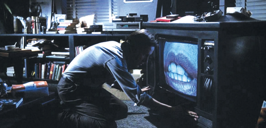 (Frame from Videodrome, dir. David Cronenberg. Director of cinematography: Mark Irwin.)